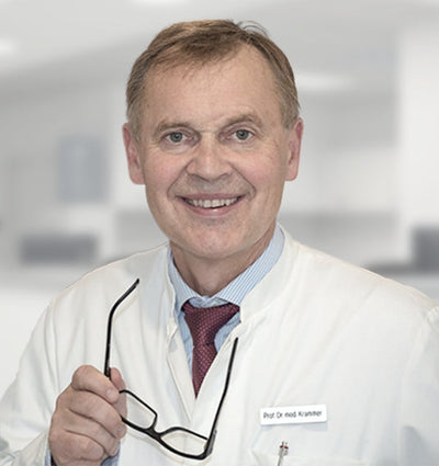 A man wearing a lab coat